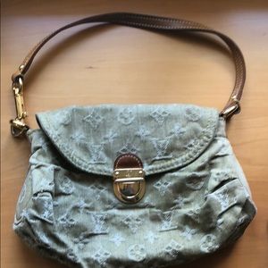 Louis Vuitton clutch in olive denim